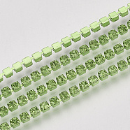 Electrophoresis Iron Rhinestone Strass Chains, Rhinestone Cup Chains, with Spool, Peridot, SS8.5, 2.4~2.5mm, about 10yards/roll(CHC-Q009-SS8.5-B06)