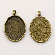 Alloy Pendant Cabochon Settings, Cadmium Free & Lead Free, Plain Edge Bezel Cups, DIY Findings for Jewelry Making, Antique Bronze, 39x25x3mm, Hole: 4mm, tray: 30x22mm(X-PALLOY-A15657-AB)