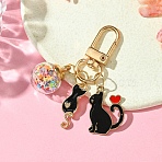 Cat Alloy Enamel Pendant Decoration, with Alloy Swivel Clasps and Glass Ball Pendant, Black, 60mm(HJEW-YW00016-01)