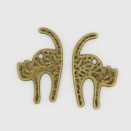 Hammered Tibetan Style Alloy Kitten Pendants, Bumpy, Cat with Arched Back Shape, Antique Bronze, Lead Free & Cadmium Free, 27x16x1mm, Hole: 2mm, about 790pcs/1000g(TIBEP-EA10991YKG-AB-LF)