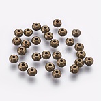 Tibetan Style Alloy Beads, Cadmium Free & Nickel Free & Lead Free, Round, Antique Bronze, 5.5x5.5x3.5mm, Hole: 1.5mm(MLF10945Y-NF)