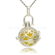 Silver Color Plated Brass Hollow Round Cage Pendants, with No Hole Spray Painted Brass Round Ball Beads, Yellow, 35x25x21mm, Hole: 3x8mm(KK-J216-18S)